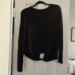 Open back black athletic long sleeved shirt